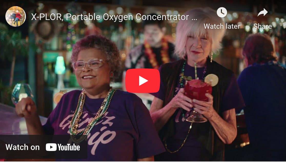 Image of a youtube video player reading “X-PLOR, Portable Oxygen Concentrator...” and "Watch on YouTube"