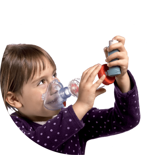 photograph of young girl using the SperaChamber with an inhaler