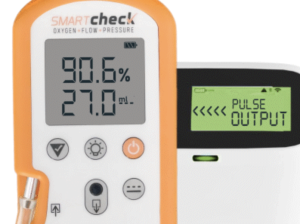 Photo of Smart Check next to a pulse concentrator